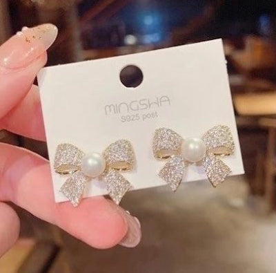 Korean bow and pearl studs studded with stones