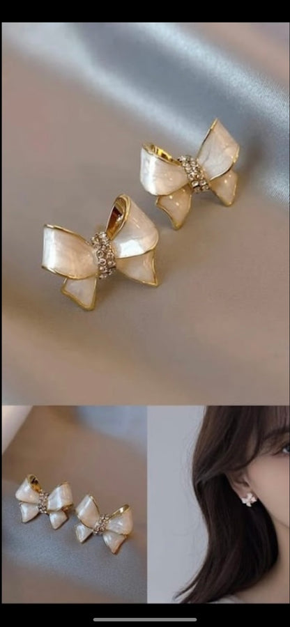 White and golden ribbon/bow earrings (Under ₹199 Deal)