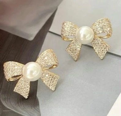 Korean bow and pearl studs studded with stones